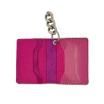BB Simon Belt Providing you a purse embed a logo stamp of BB Simon on a Pink color Wallet with a silver color of chain
